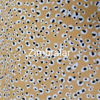 Tecido Popeline Plastificado com PVC Amarelo Manchas Leopardo 1.50m largura
